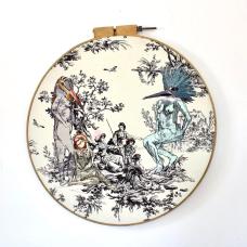 embroidered bird people and birds on  vintage toile decor fabric.