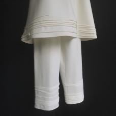 Horizontal details created by folding and stitching.