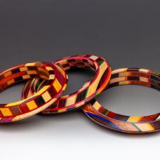 The new &amp;quot;Unbound&amp;quot; series created in 2024. the laminate comprised of bold natural wood colors and dyed Maple veneer. The hardwoods are all sustainably harvested throughout the world