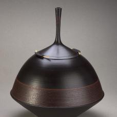 Thrown dark brown shiny terracotta vase with black accents.