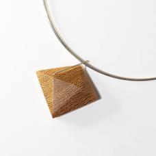 Lati Wood hand shaped and polished with Argentium Silver hoop detail on Sterling Silver Collar. A locking system is employed to bond the metal and wood. A keyhole system is drilled within the wood and the metal is knurled before epoxying wood and metal together.