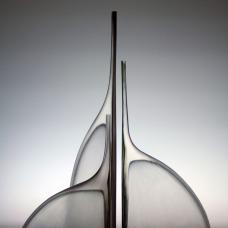 blown glass  wheel cut surfaces.