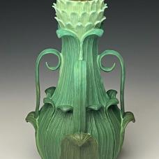 plant-like earthenware clay vase.