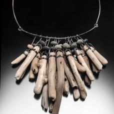 Hand fabricated sterling silver necklace with driftwood and rocks from Lake Superior