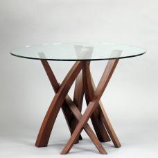 Round glass top  The base is made of walnut consisting of seven tapering arcs of varying size which intersect to form the dynamic structure.