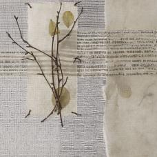 Handwoven silk  antique text with handmade paper  and twigs  stitched