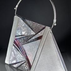 Evening handbag made of stainless steel mesh  decorated with the illusion foil. Adjustable handle made of aircraft cable