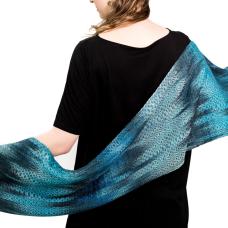Handwoven shawl  hand painted warp and hand dyed tencel a sustainable yarn from Eucalyptus trees. Woven in original pattern on a floor loom. Colors and pattern pay homage to the Splendid Fairy Wren with bold blends of royal blue  aqua  navy and black.