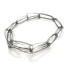 Necklace Sterling silver oxidized with nylon coated steel wire Constructed.