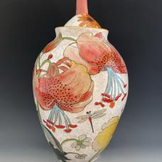 Vase made with a combination of hand-building and wheel-throwing techniques with painterly glaze and under glaze decoration of lillies.