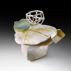 solid and wire structures and juxtaposed together to create a sense of cluster and the rhythm in the space. 18k gold  sterling silver  aquamarine.