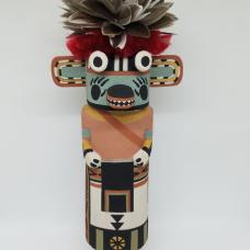 Carved from cottonwood root  painted with natural earth pigment paints. Other materials used  duck feathers and natural dyed goat hair.