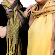 Handwoven shawl  hand painted warp and hand dyed tencel a sustainable yarn from Eucalyptus trees. Woven in original pattern on a floor loom. Colors and pattern pay homage to the Cedar Wax Wing w/asymmetrical stripes and gradient from yellow to brown.