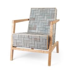Easy chair with a cantilever frame construction made from maple wood. The &amp;quot;upholstery&amp;quot; is made up of scrap wood tiles that have been textured  painted with several colors of milk paint and have then been sanded for a distressed look. These are mounted to a hollow form box of baltic birch