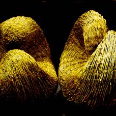 Two woven willow forms