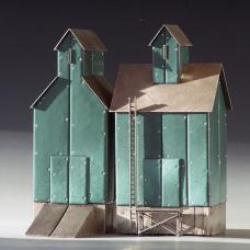 Sterling silver and traditional kiln-fired glass enamel on copper.