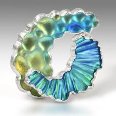 Brooch with textured glass