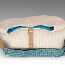 white purse with blue patterned strap