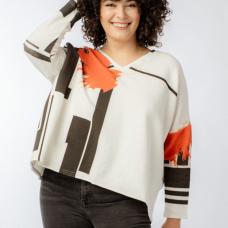 black and white top with splash of orange